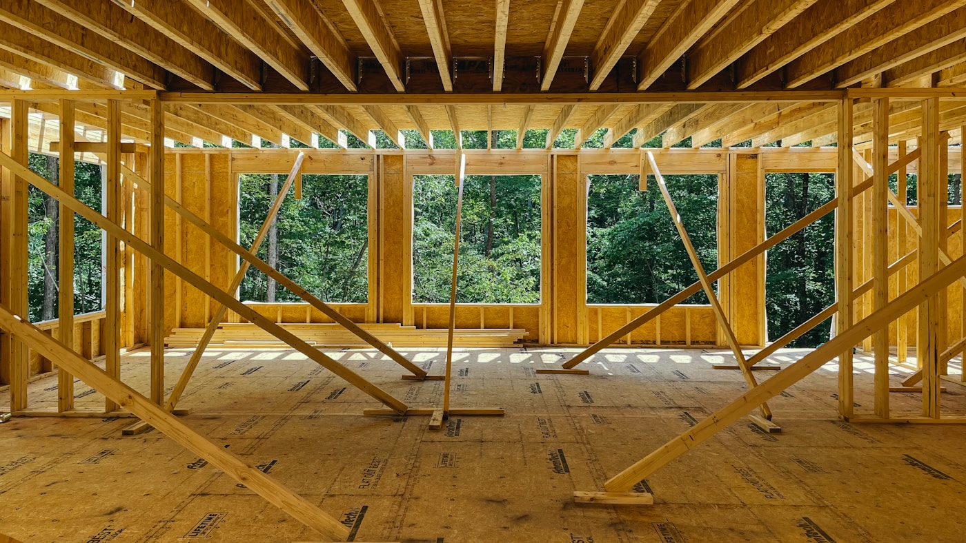 Exposed wood framing inside a home under construction