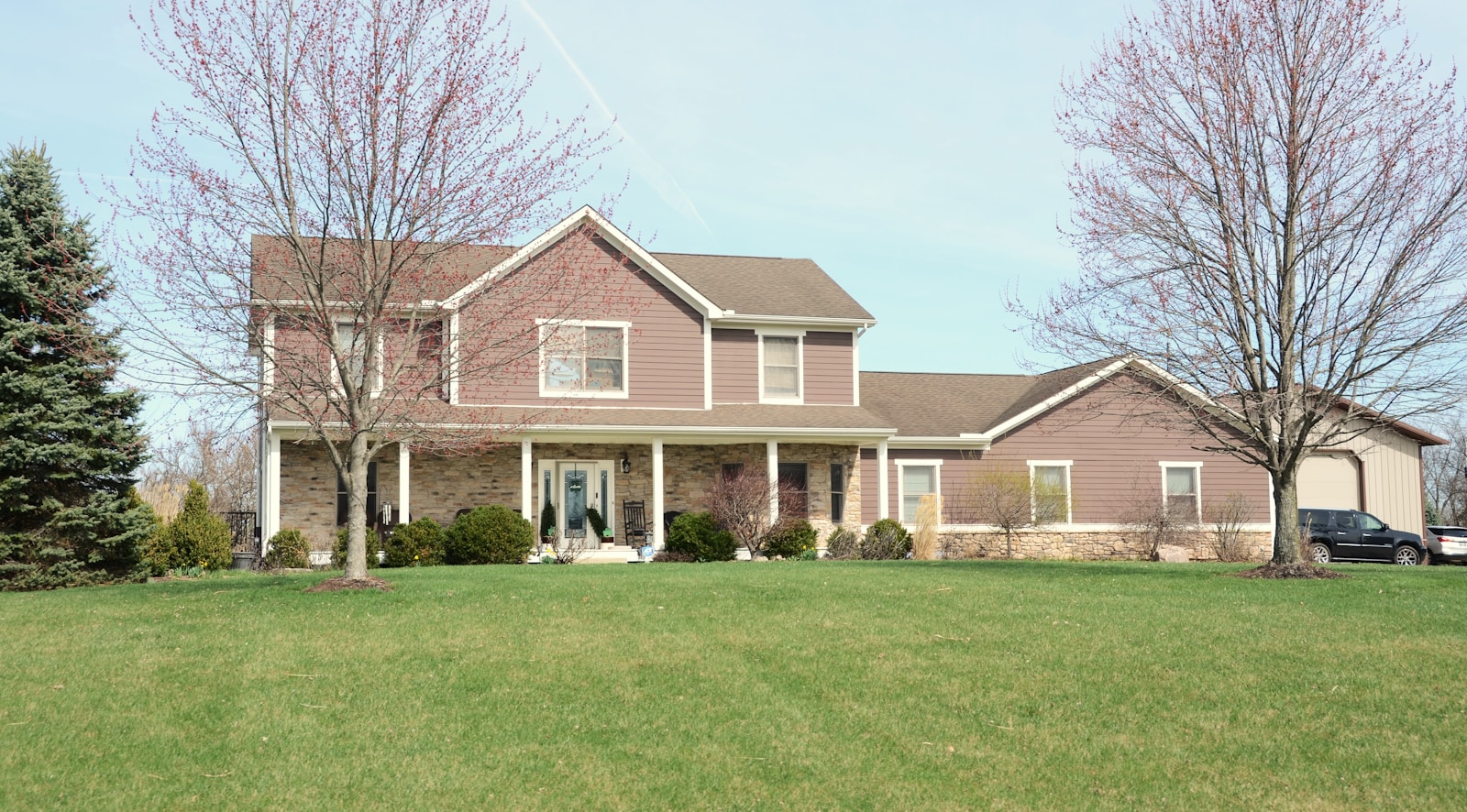 Residential home with a landscaped front lawn
